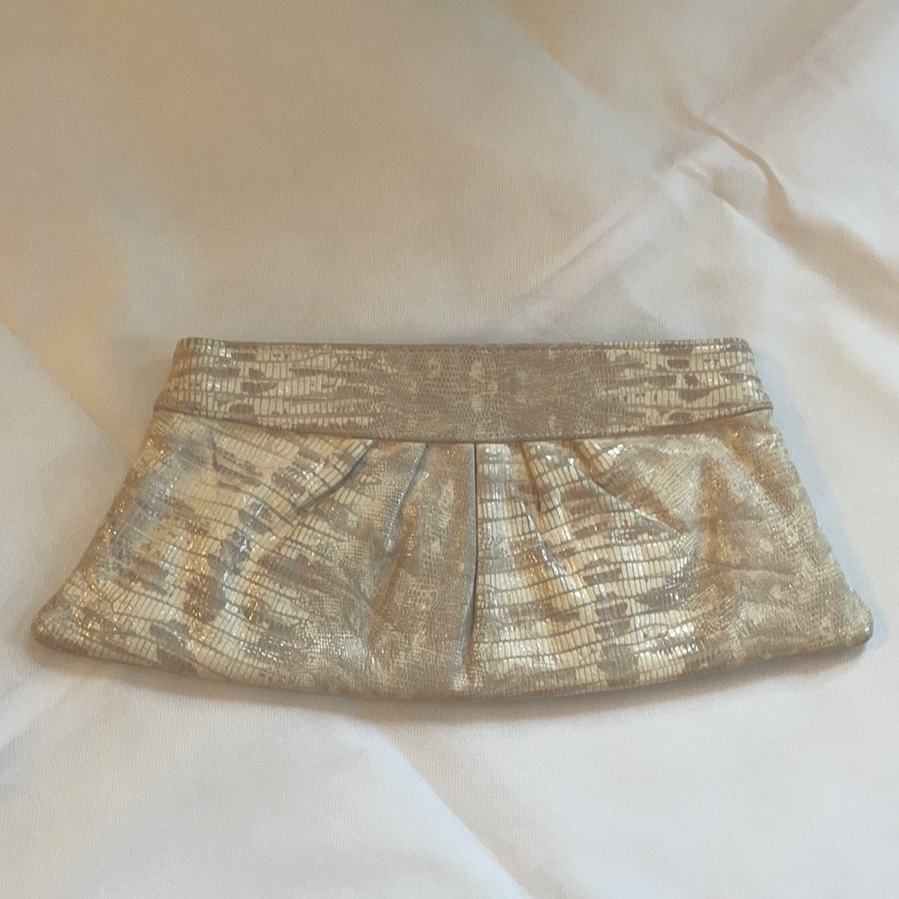 Ivory/champagne colored Lauren Merkin snakeskin clutch